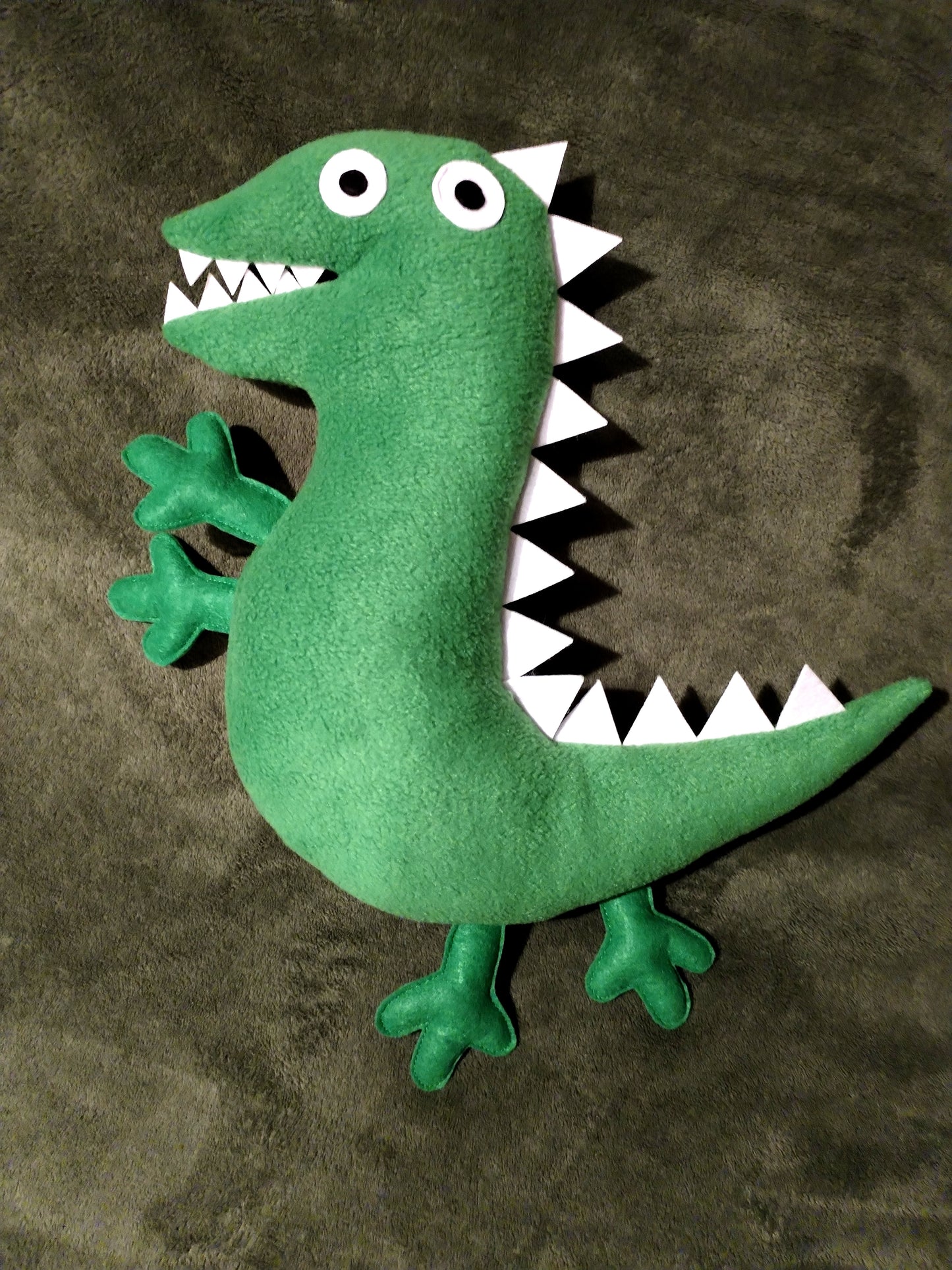 Mr. Dinosaur or Teddy bear